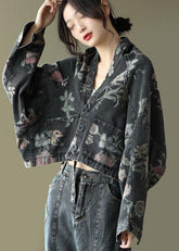 Schwarzes Denim-Oberteil mit Fledermausärmeln und Print
